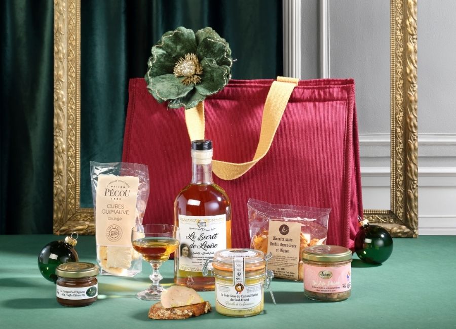 Coffret Valette Plaisirs Gourmets avec son sac isotherme en velours et ses spécialités gourmandes.